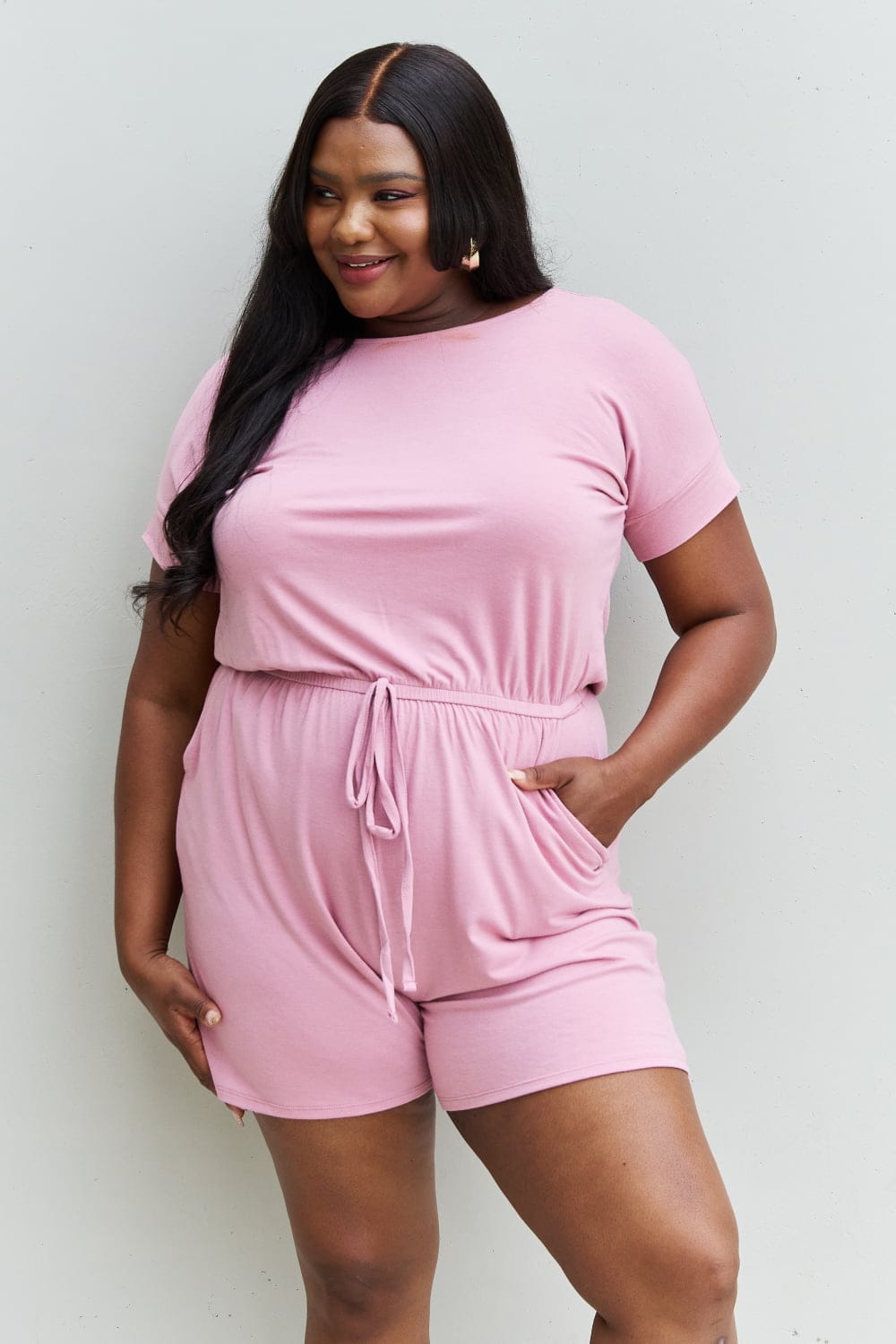 Pink Full Size Short Sleeve Romper in Light Carnation.