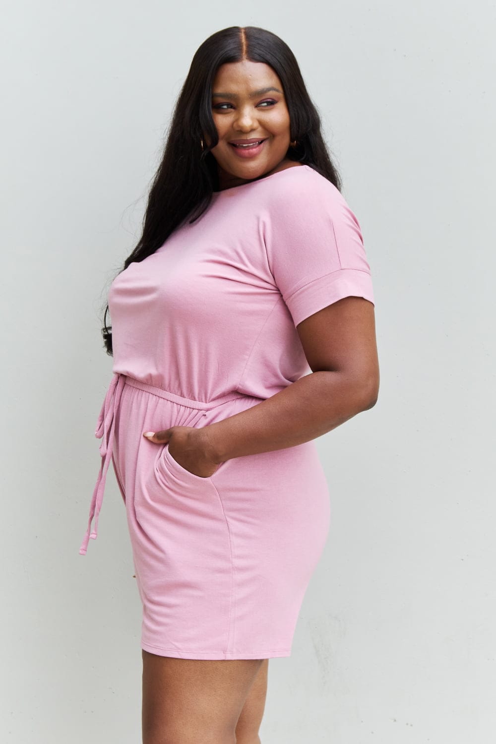 Pink Full Size Short Sleeve Romper in Light Carnation.