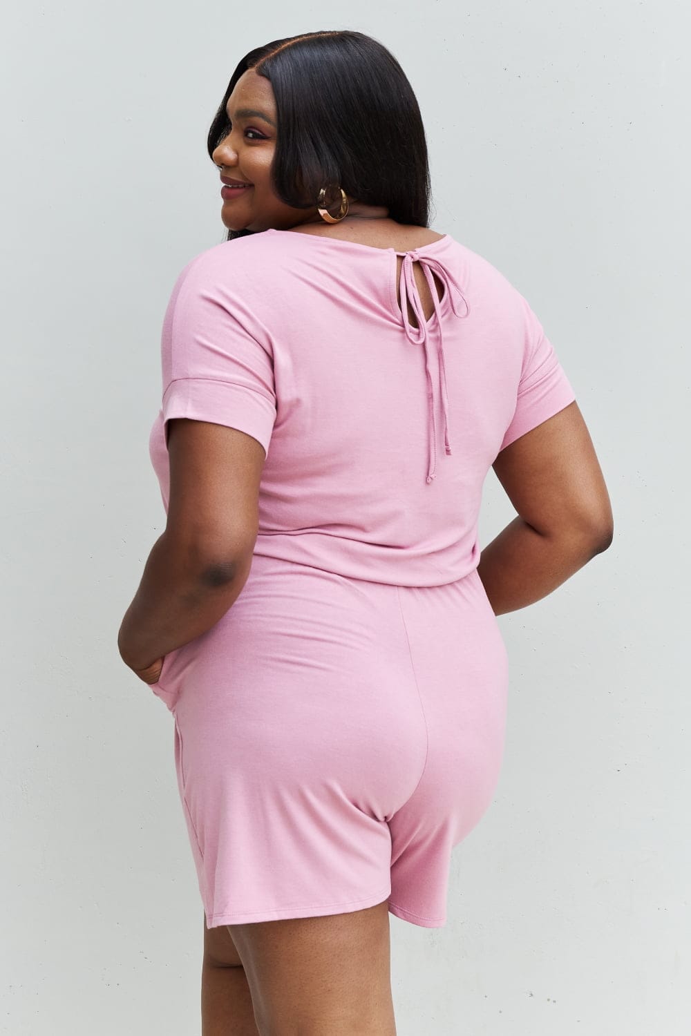 Pink Full Size Short Sleeve Romper in Light Carnation.